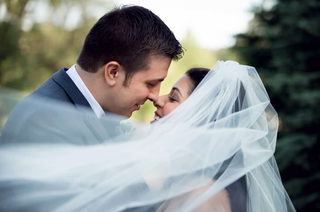 kiss behind veil - bride and groom at falkirk estate