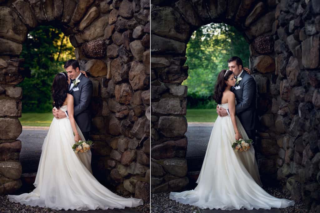 bride and groom by stone archway at falkirk estate