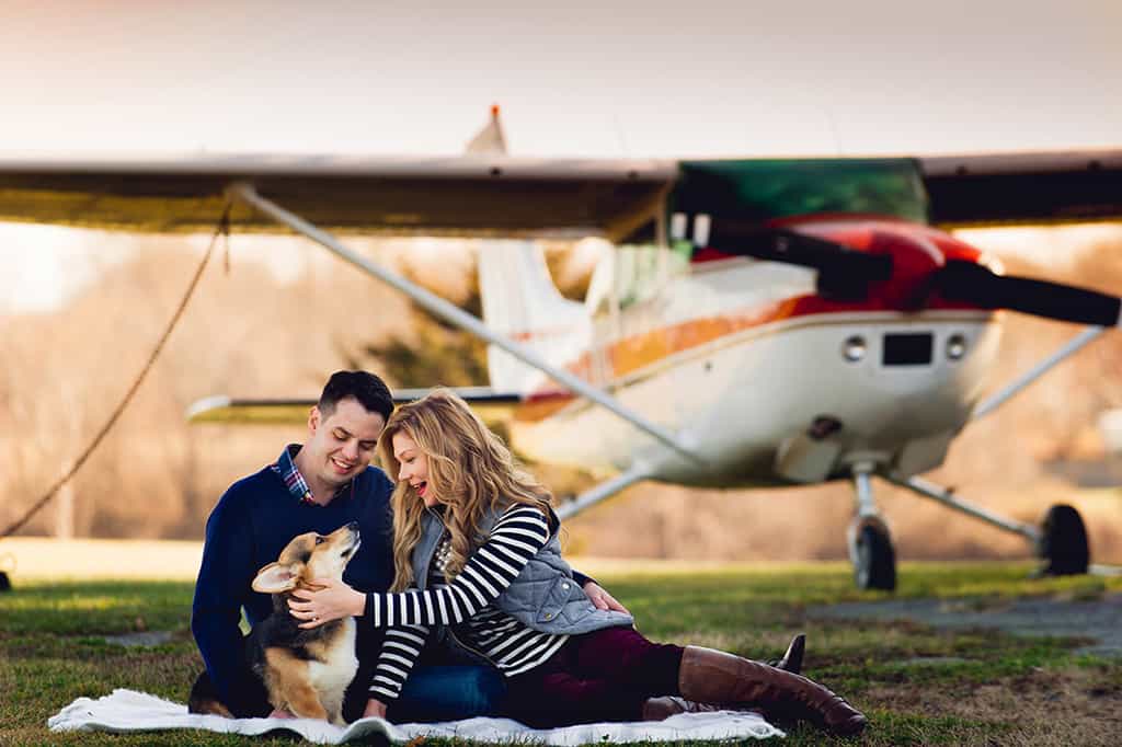 engagement session with airplane at airport