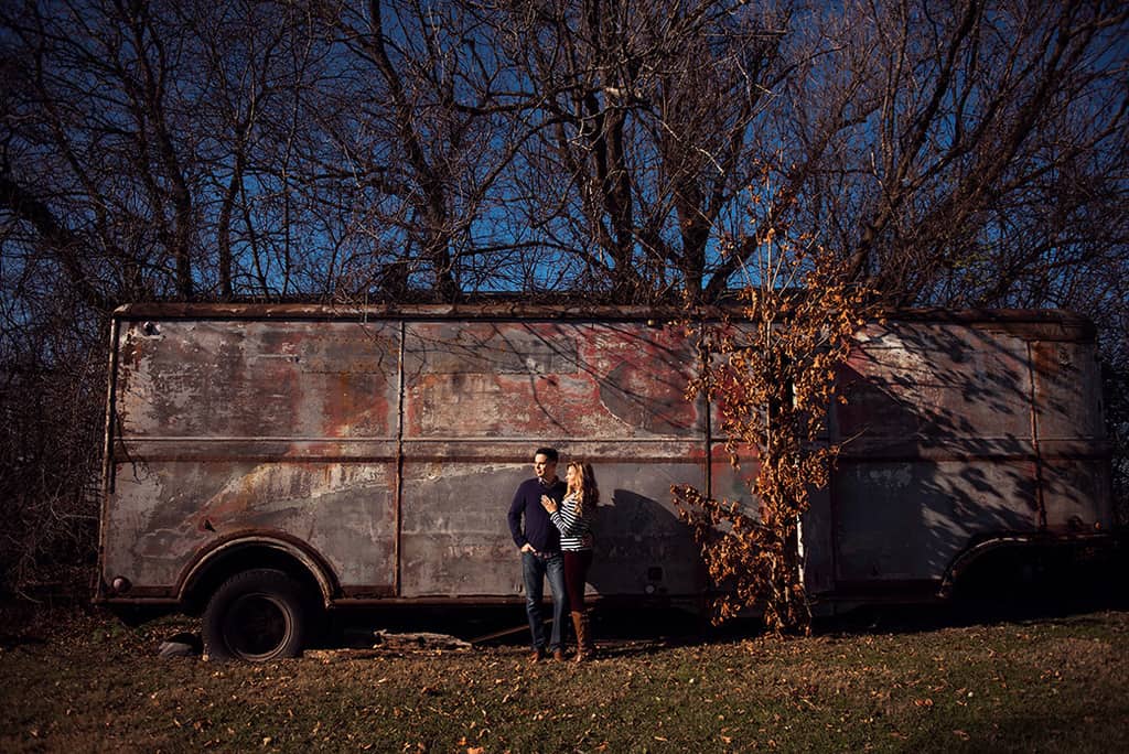 engagement photo with vintage trailer