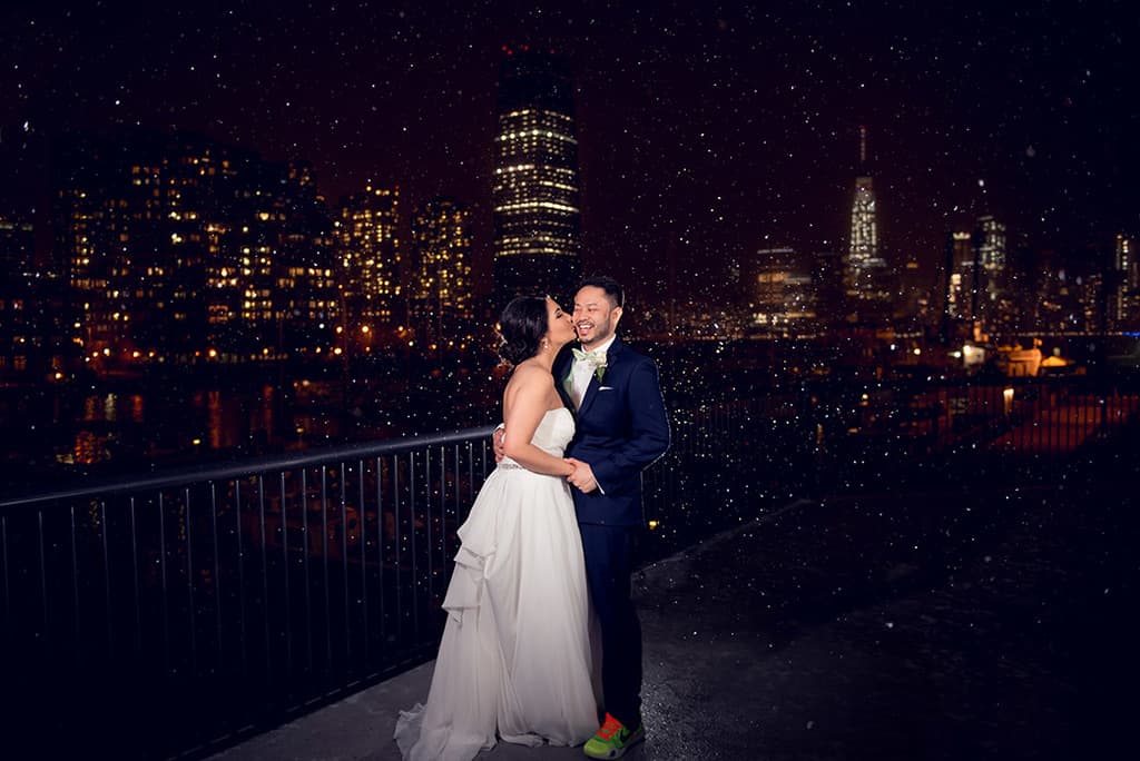 Snowy Bride & Groom Evening Portrait at Maritime Parc Wedding NYC evening skyline