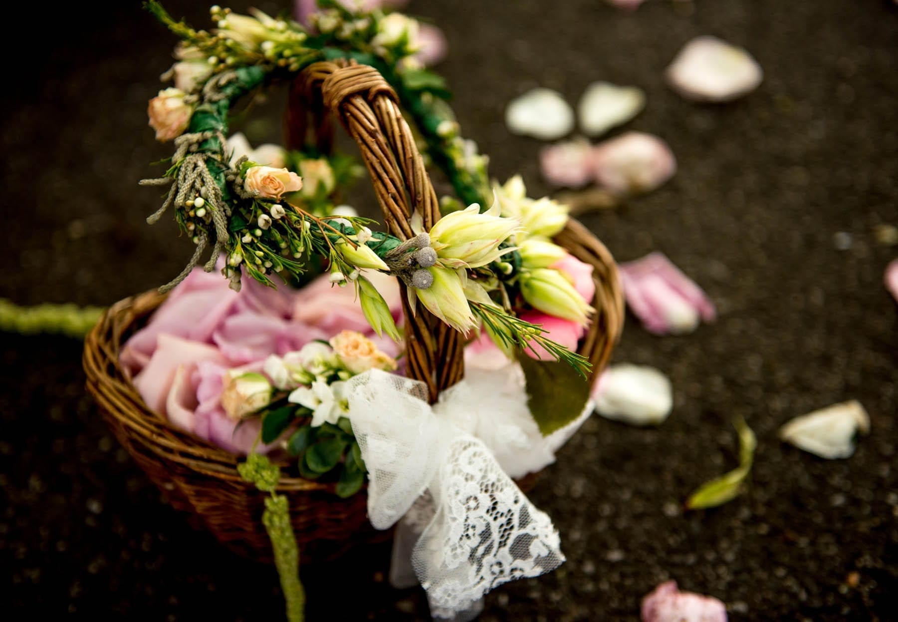 flower girls basket and floral crown at boho wedding