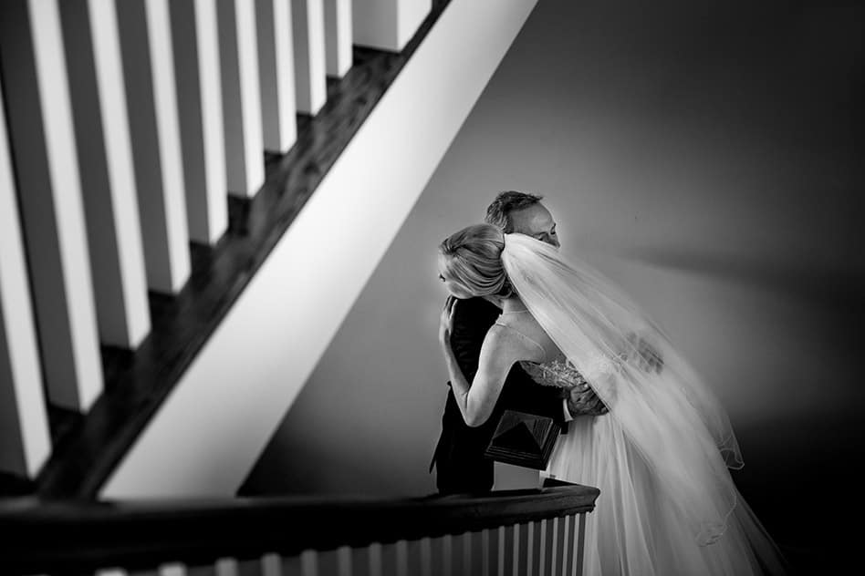 father daughter first look on stairs