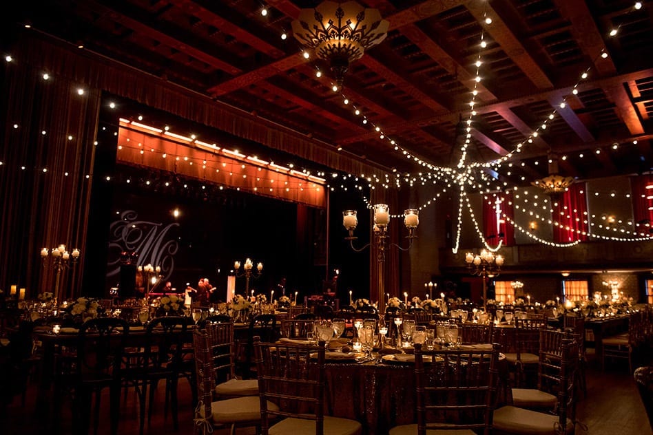 elegant candle light with bulb lights reception space at scranton cultural center
