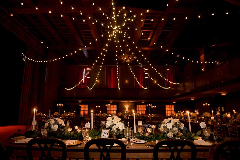 candle lit reception room at scranton cultural center with strung bulb lights