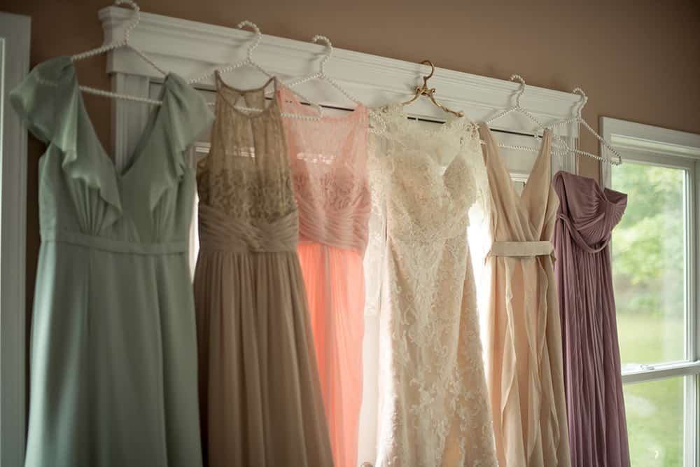 Maggie Sottero lace wedding dress with lace bolero and ethereal pastel bridesmaids dresses