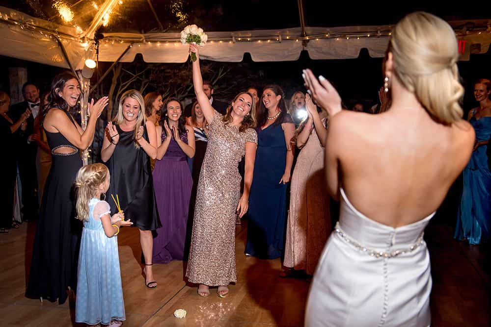 bouquet toss at bedford post tent reception