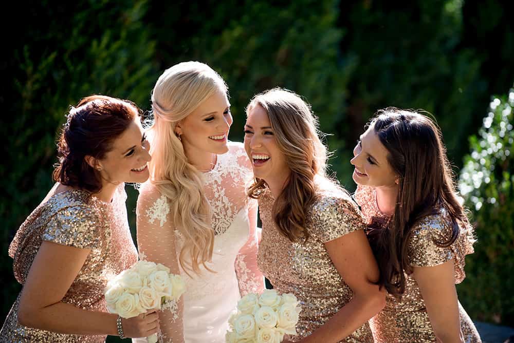 bride and bridesmaids in bronze sequin dresses at bedford post inn