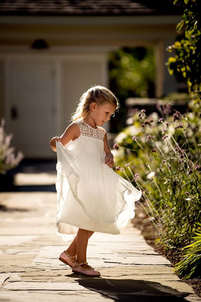 flower girl twirling at bedford post inn wedding