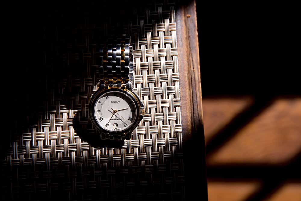 two toned metal groom's Orient watch