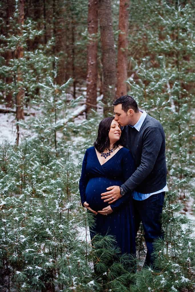 Winter Maternity Session in Forest with Navy Blue Maternity Gown