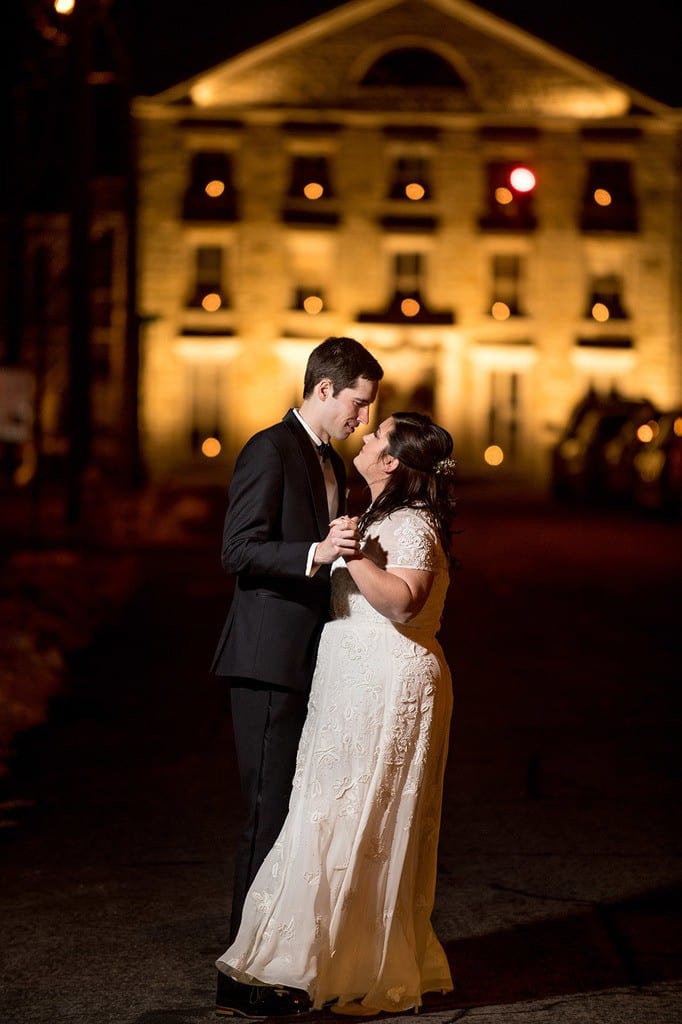 Romantic Bride & Groom evening portrait in downtown Hudson NY