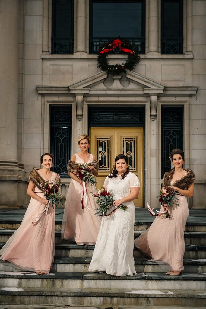 bridesmaids portrait downtown Hudson NY winter wedding - dresses by BHLDN