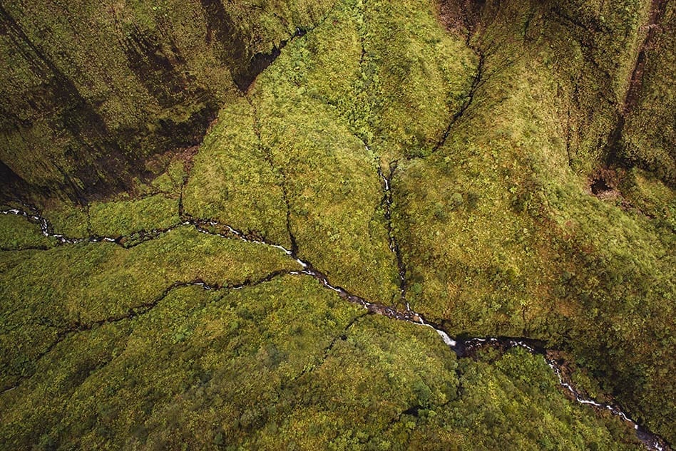Waterfall at Mount Waiʻaleʻale in Kauai HI - Island Helicopters tour