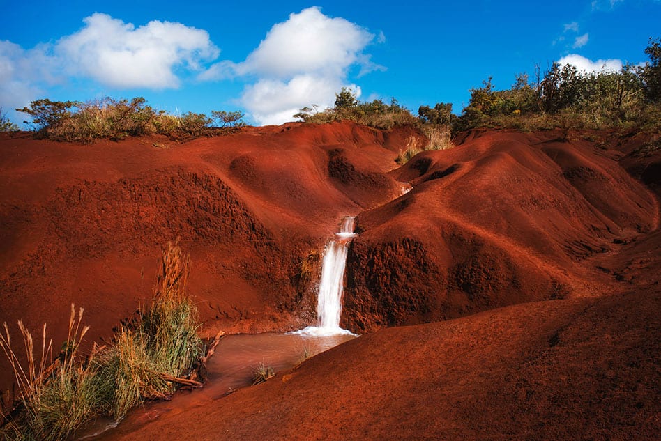 Red dirt falls in Waimea Canyon State Park Kauai Hawaii 