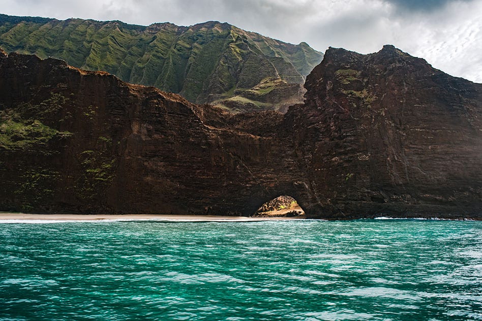 Sea caves on Na Pali Coast Holo Holo Charters sunset cruise on Kauai Hawaii