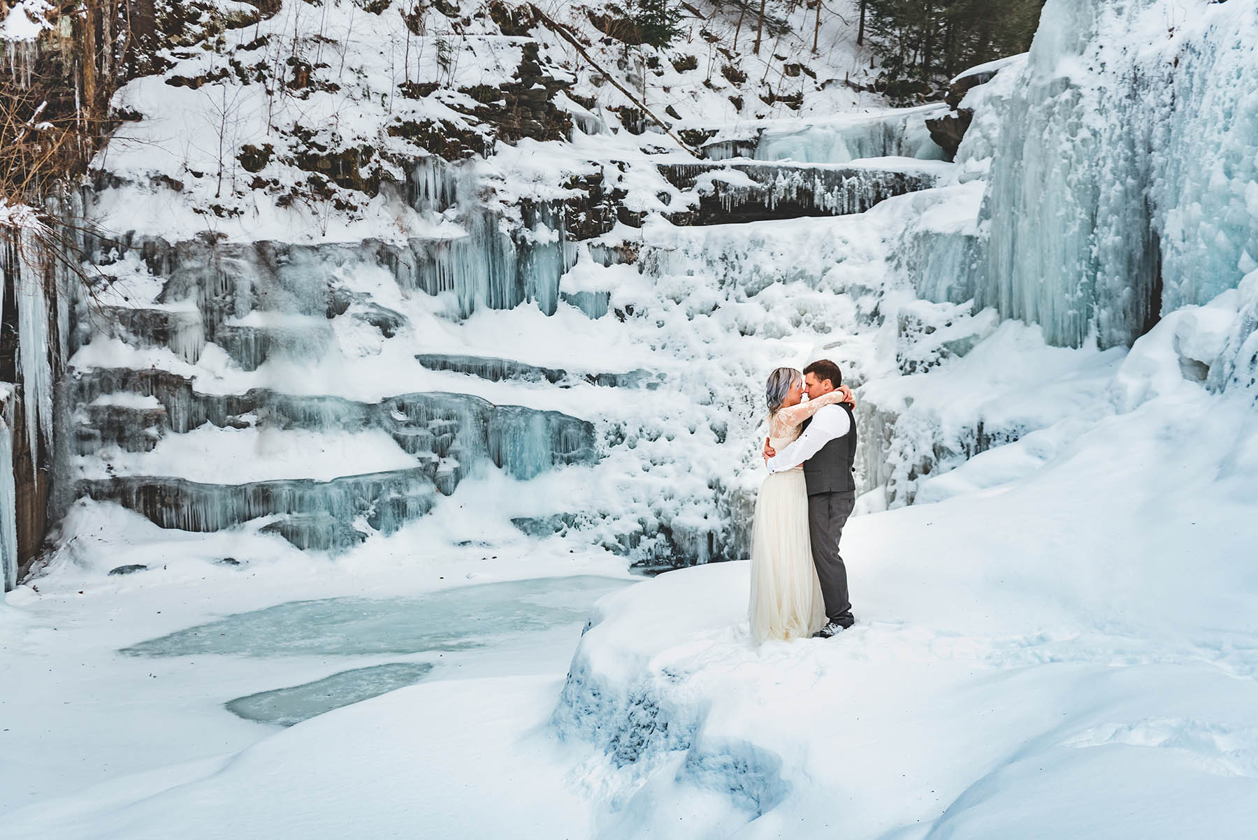 magical winter wedding location at frozen waterfall