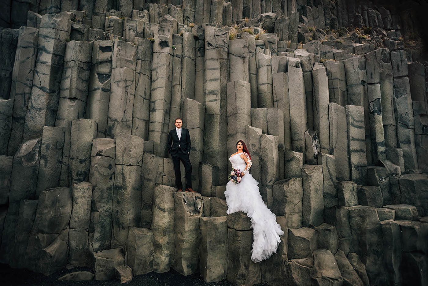 Wedding Photos on Basalt Columns at Reynisfjara Black Sand Beach Iceland