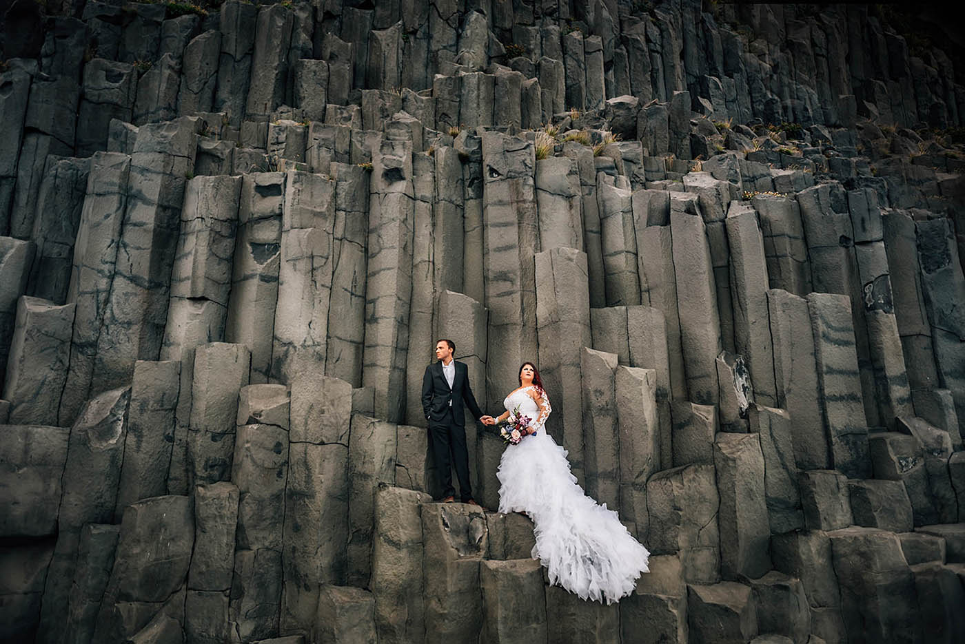Elopement Pictures on Basalt Columns at Reynisfjara Black Sand Beach Iceland