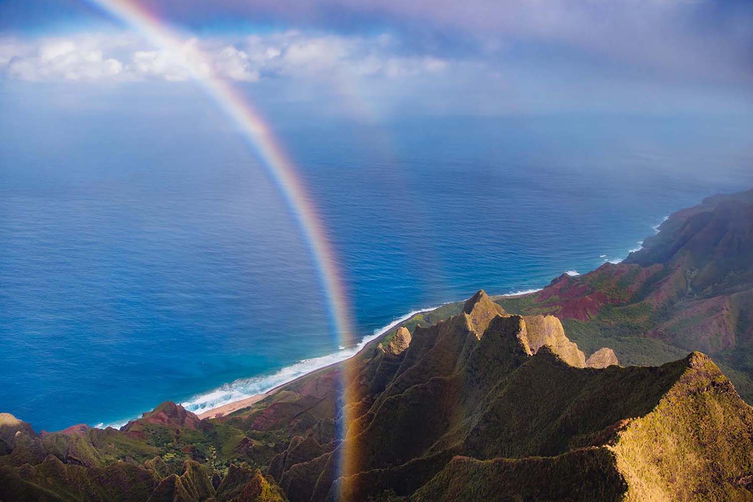 Rainbow on Napali Coast in Kauai Hawaii