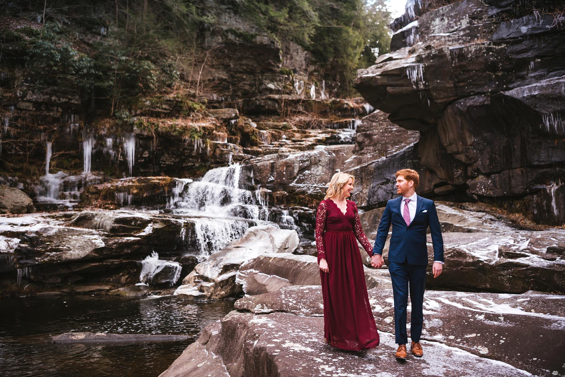 winter waterfall adventure engagement session