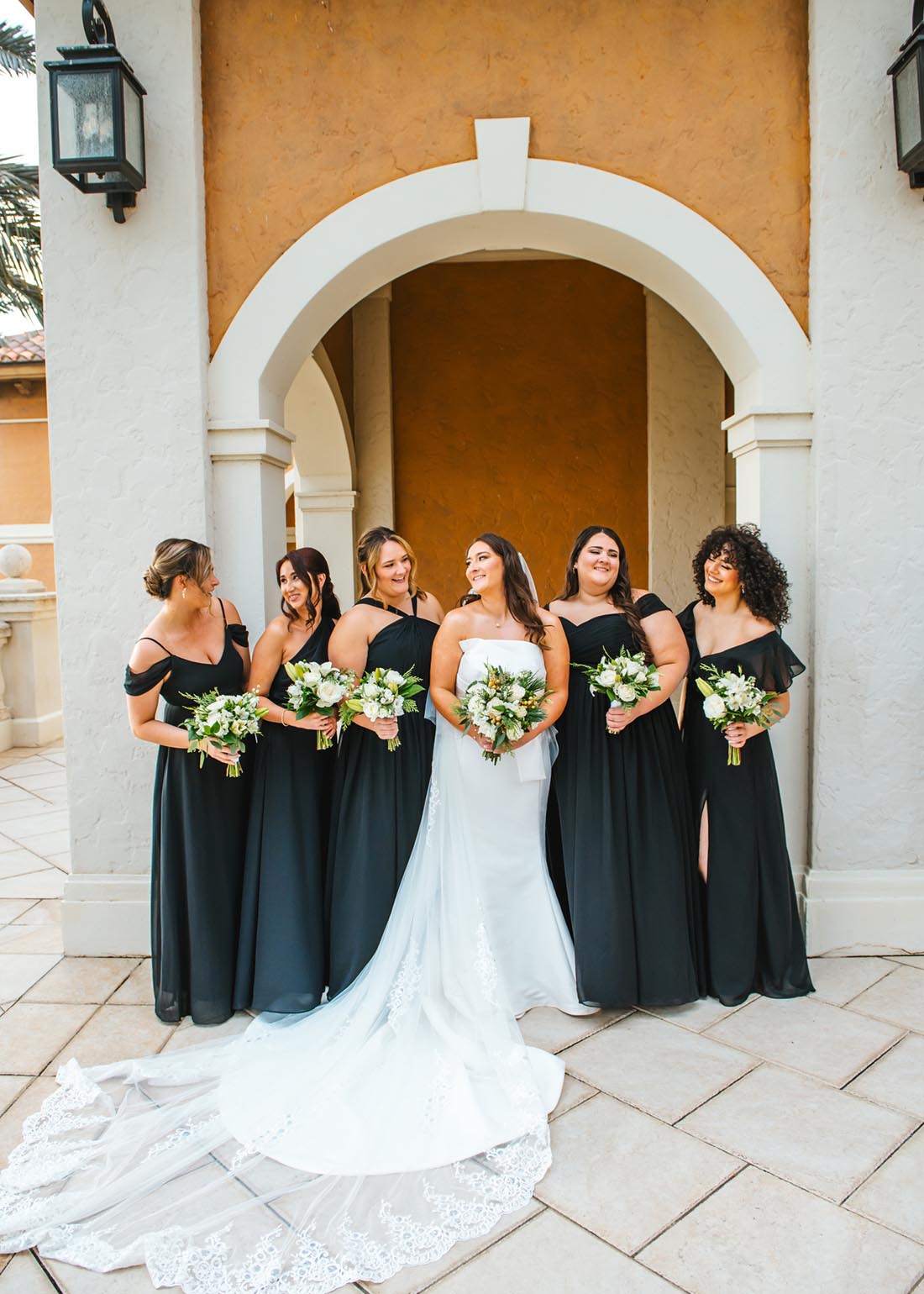 Bridesmaids in elegant black dresses at The Crane Club at Tesoro   Wedding